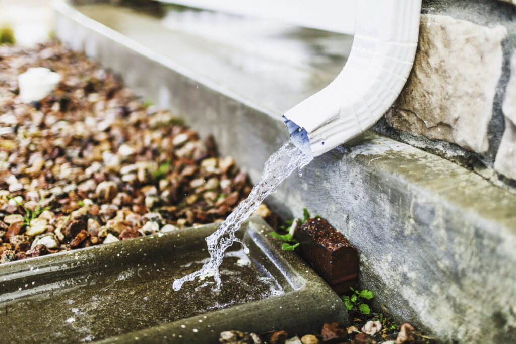 Water Draining From Gutter